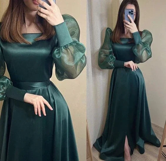 Woman wearing emerald green satin long dress with sheer puff sleeves, ZAPDRESS fashion