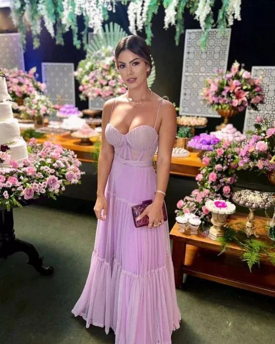 Woman in lilac evening dress at elegant floral event, ZAPDRESS fashion inspiration