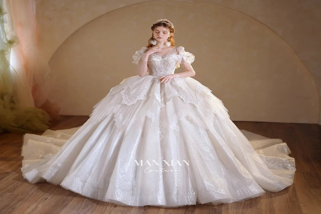 Luminous Ivory Sweetheart Glitter Tulle Ball Gown with Ruffled Sleeves, Pearl Embroidery &amp; Lace Train M013 by ZAPDRESS