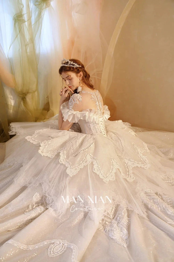 Luminous Ivory Sweetheart Glitter Tulle Ball Gown with Ruffled Sleeves, Pearl Embroidery &amp; Lace Train M013 by ZAPDRESS