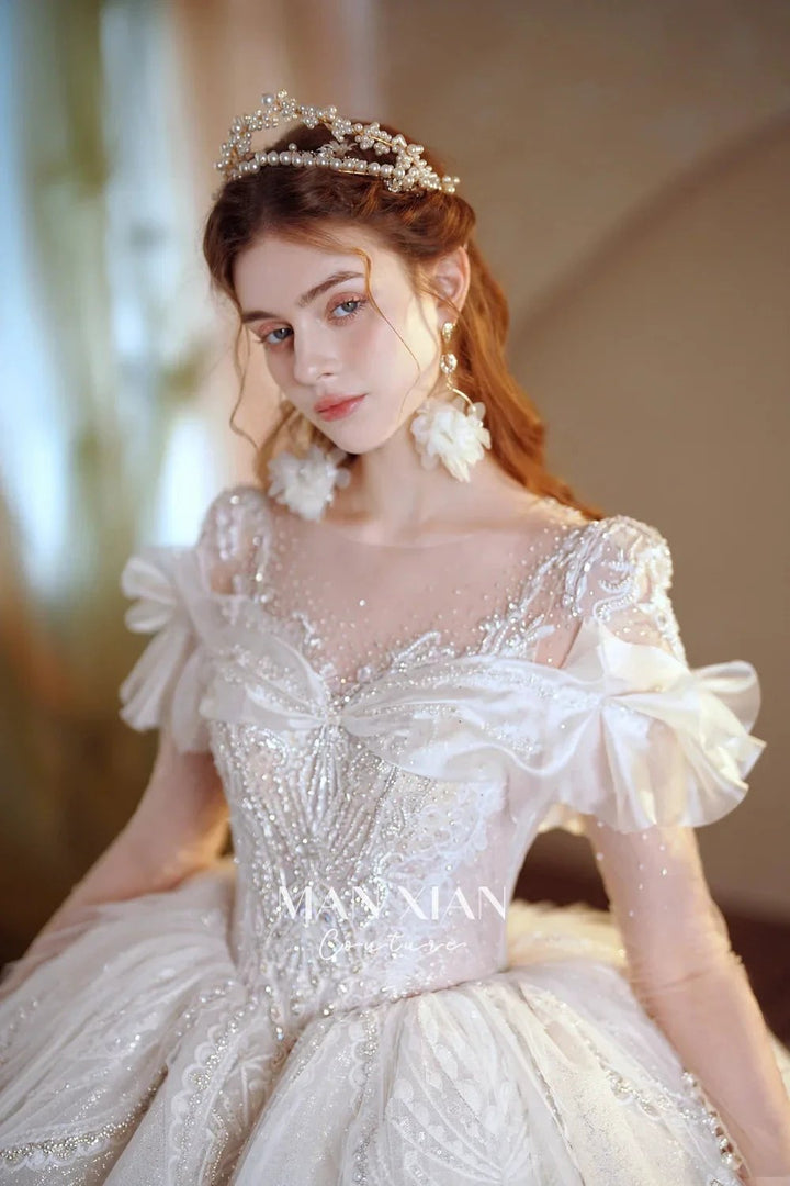 Luminous Ivory Sweetheart Glitter Tulle Ball Gown with Ruffled Sleeves, Pearl Embroidery &amp; Lace Train M013 by ZAPDRESS