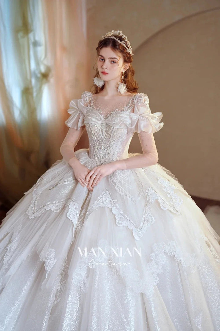 Luminous Ivory Sweetheart Glitter Tulle Ball Gown with Ruffled Sleeves, Pearl Embroidery &amp; Lace Train M013 by ZAPDRESS