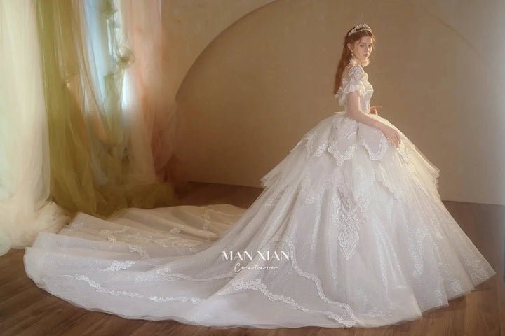 Luminous Ivory Sweetheart Glitter Tulle Ball Gown with Ruffled Sleeves, Pearl Embroidery &amp; Lace Train M013 by ZAPDRESS