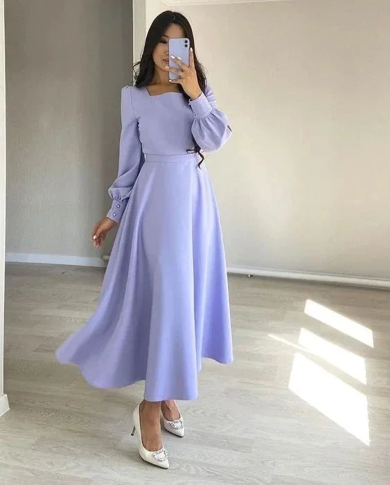Woman in light purple long-sleeve maxi dress posing indoors, ZAPDRESS fashion style
