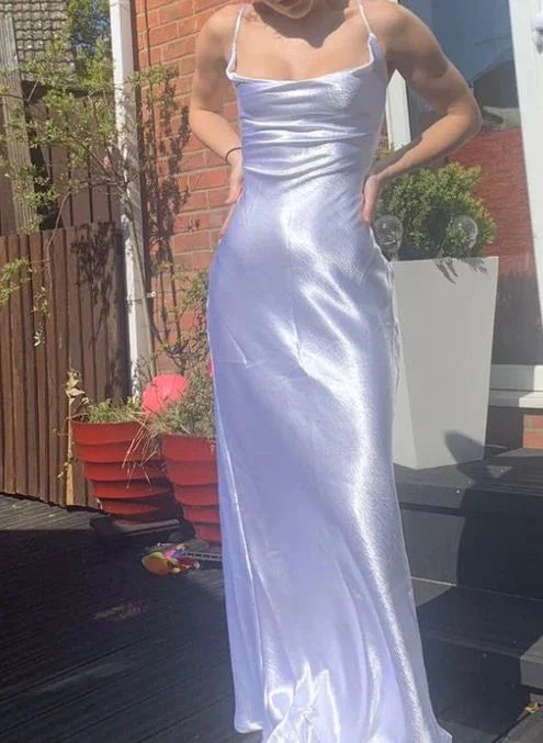 Woman wearing a shiny lilac satin evening dress in sunlight, ZAPDRESS fashion style