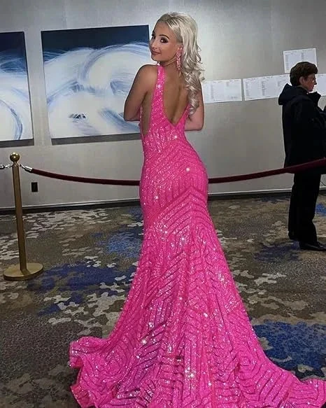 Woman in a sparkling pink backless evening gown at a formal event, ZAPDRESS fashion