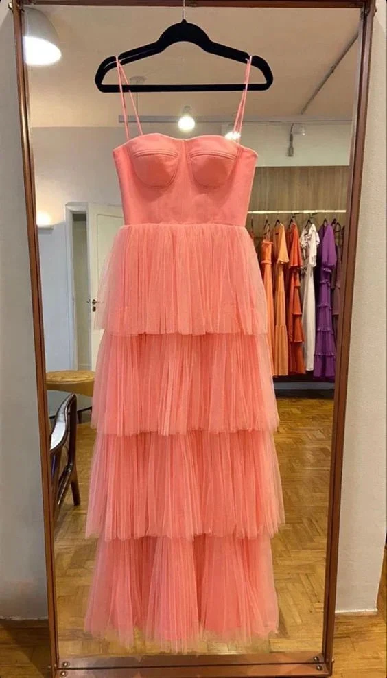 Tiered pink tulle dress with spaghetti straps on hanger in boutique, ZAPDRESS fashion