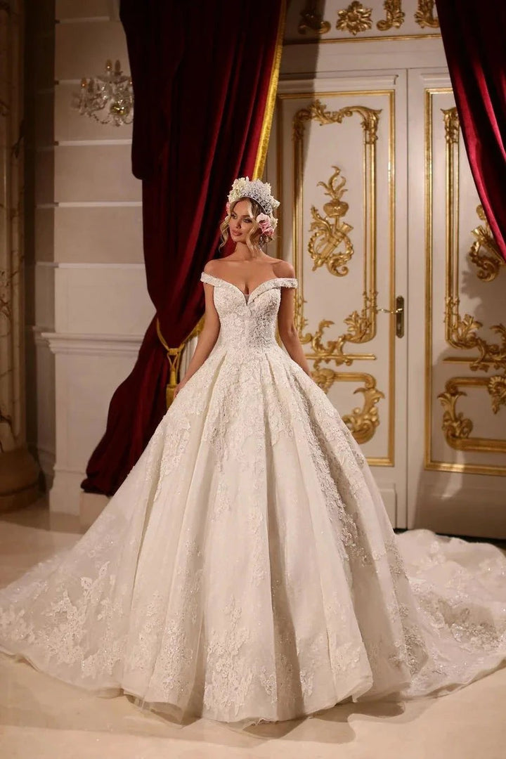 Luxurious A-line Long Off-the-shoulder Appliques Beading Wedding Dress With Train by misshow.com
