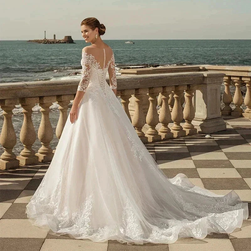 MACDUGAL Exquisite Three-Quarter Sleeves Mopping O-Neck Lace Charming Applique Back Lace Double Button Wedding Dress by payinti