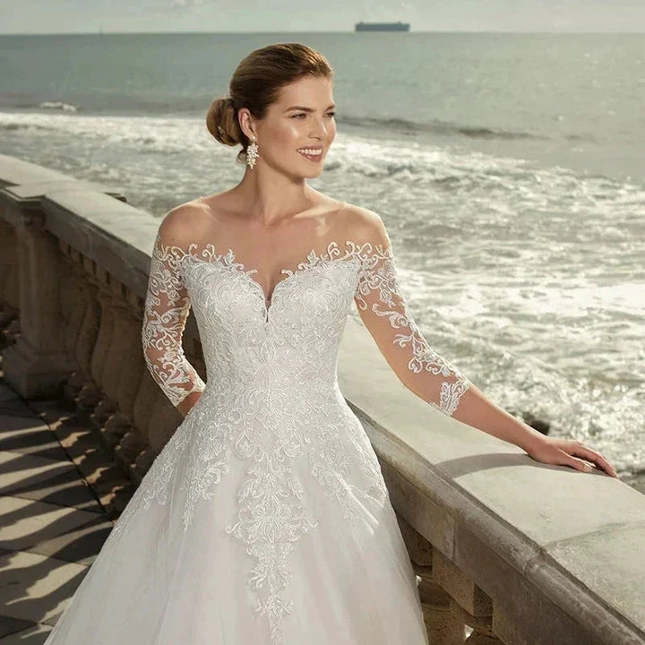 MACDUGAL Exquisite Three-Quarter Sleeves Mopping O-Neck Lace Charming Applique Back Lace Double Button Wedding Dress by payinti