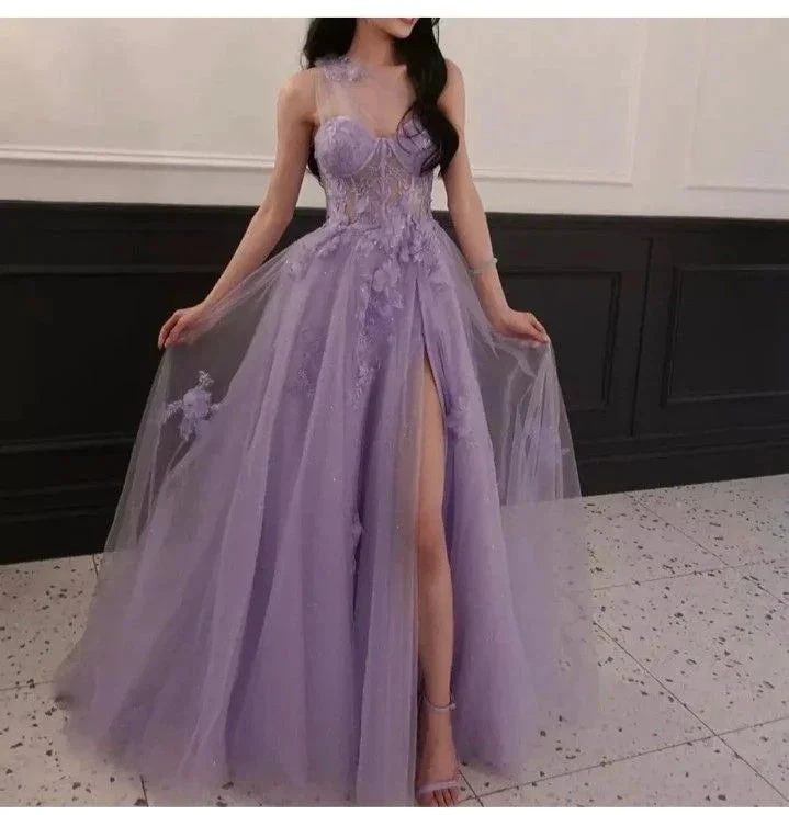 Elegant woman in lavender tulle evening gown with floral details and thigh-high slit from ZAPDRESS