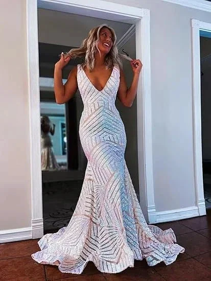 Woman in a sparkly white mermaid evening gown posing indoors, ZAPDRESS formal dress