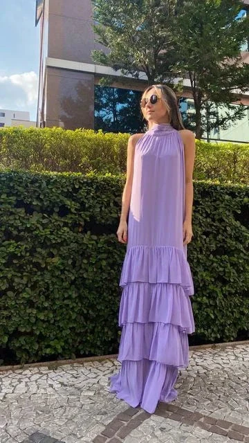 Woman wearing a tiered lavender maxi dress outdoors, ZAPDRESS fashion style