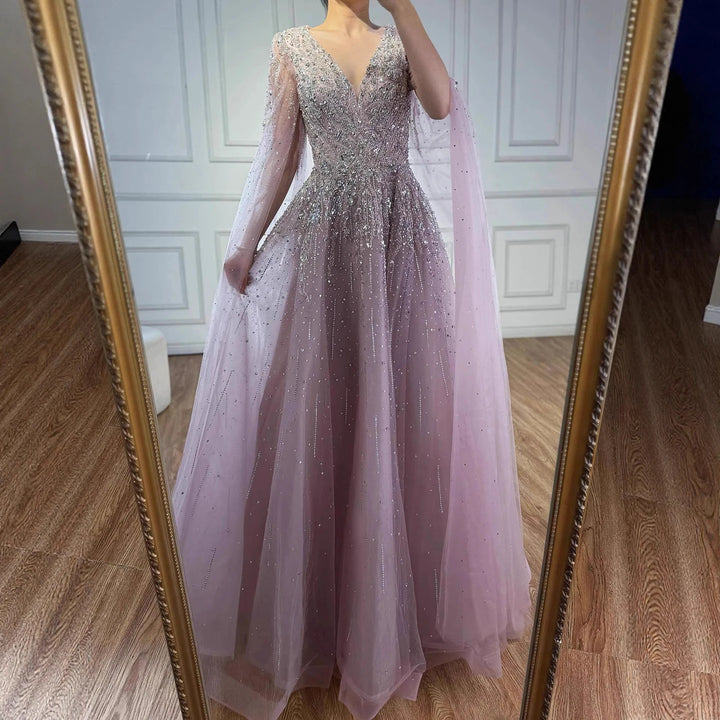 Serene Hill 2026 Customized Pink Luxury Beaded A Line Evening Dress with Cape Sleeves Party Gowwns for Wedding Guest DLA73269