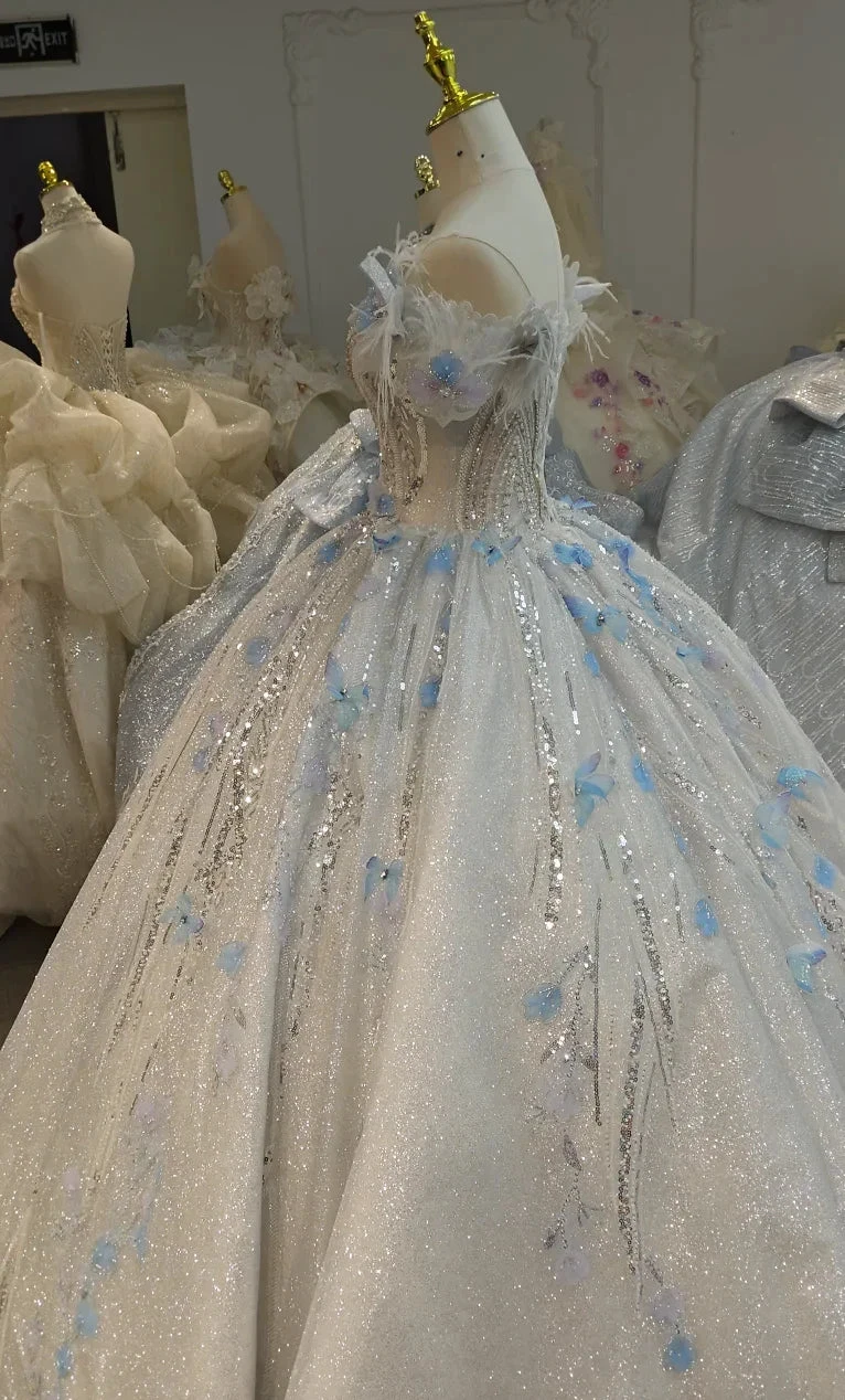 Ethereal Off-the-Shoulder Ball Gown Wedding Dress with Sequin Tulle, 3D Pastel Florals &amp; Feather Accents Ye-2028 by ZAPDRESS