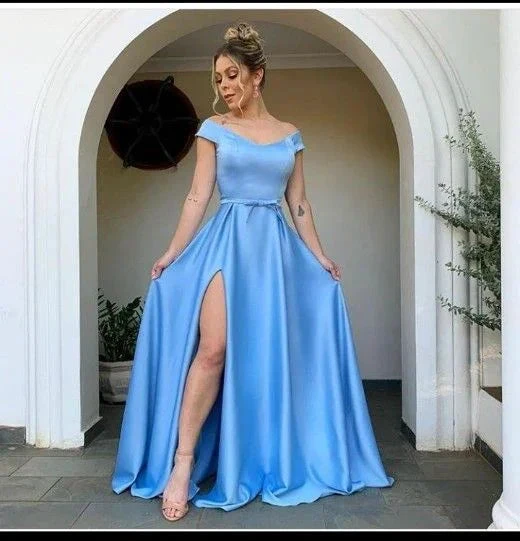 Woman wearing elegant off-shoulder blue evening dress with thigh-high slit, ZAPDRESS