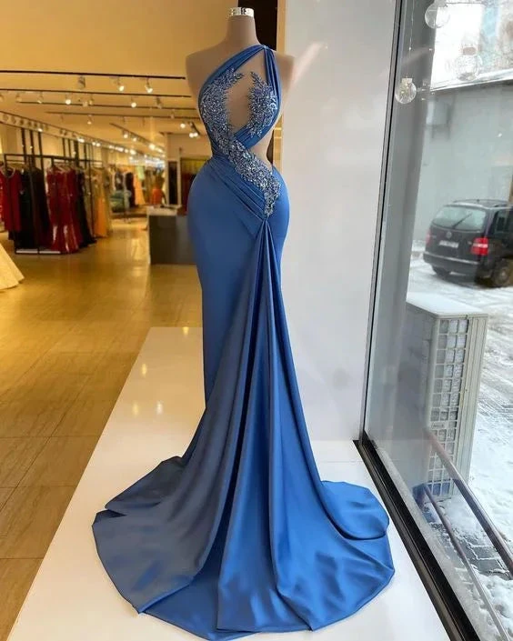 Elegant blue evening gown with lace details on mannequin in ZAPDRESS boutique window display