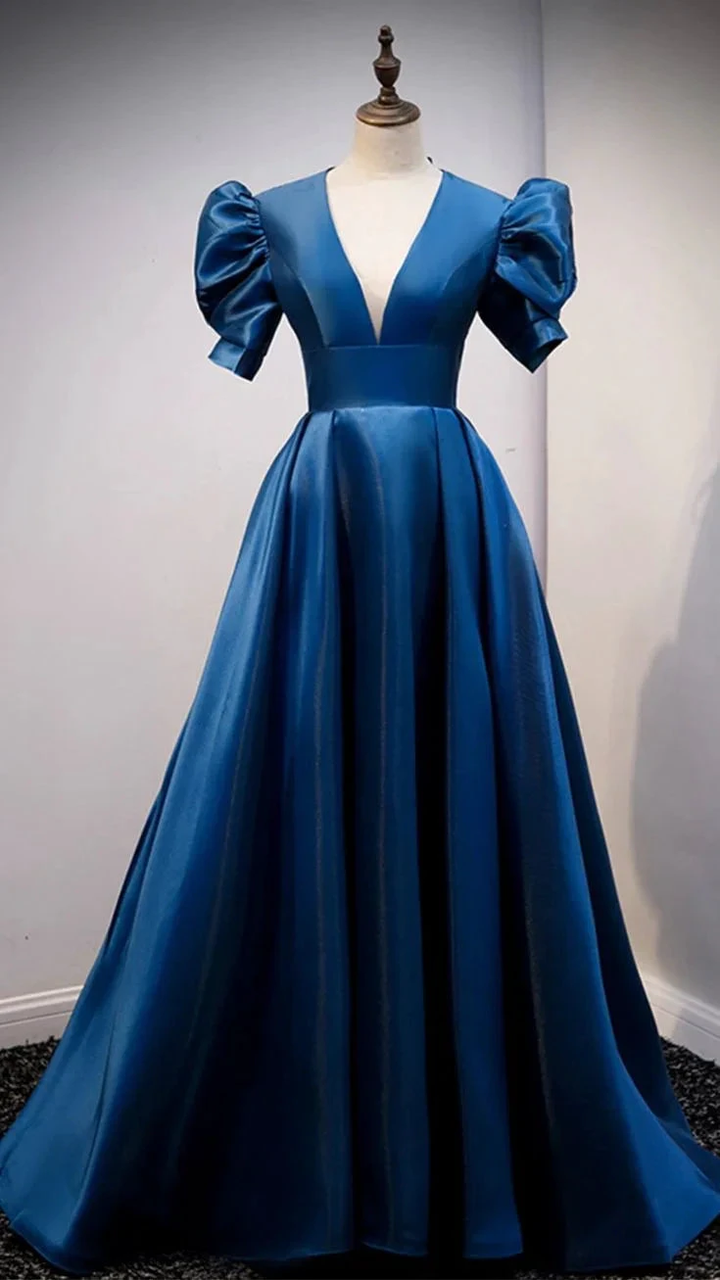 Elegant blue evening dress with puff sleeves and deep V-neck on a mannequin, ZAPDRESS