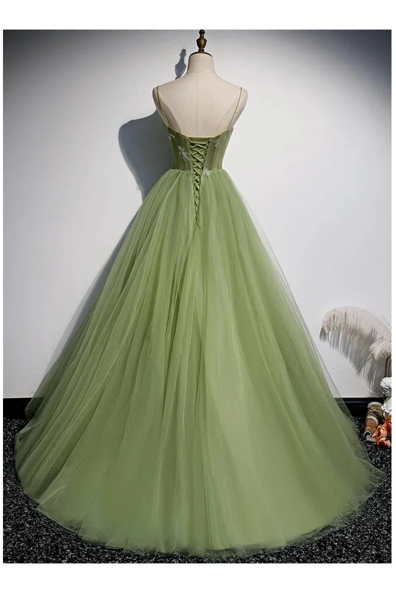 Elegant green tulle ball gown with lace-up back on mannequin, Zapdress formal dress