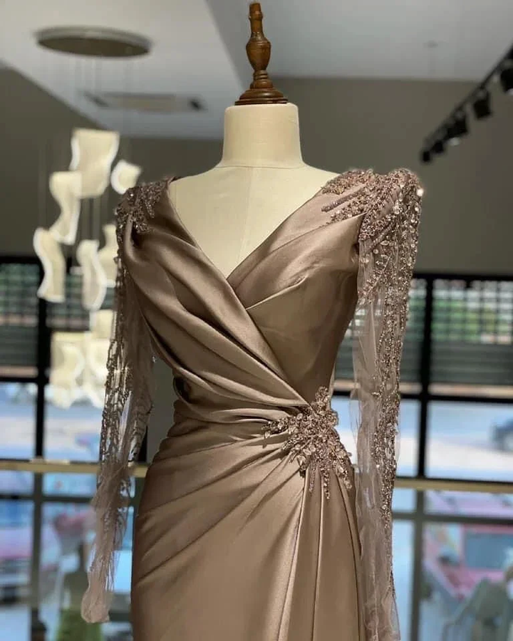 Elegant long-sleeve champagne evening dress with lace details on mannequin at ZAPDRESS
