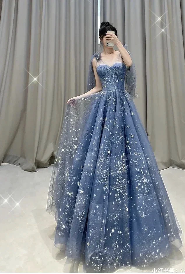 Elegant blue starry evening gown with sweetheart neckline displayed indoors, ZAPDRESS fashion