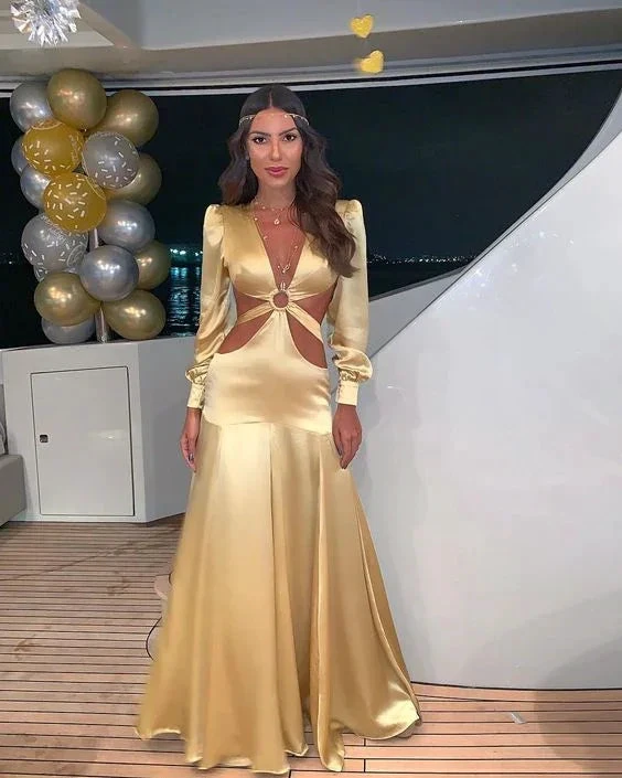 Woman in a gold satin cut-out evening gown on a yacht, with gold and silver balloons, ZAPDRESS