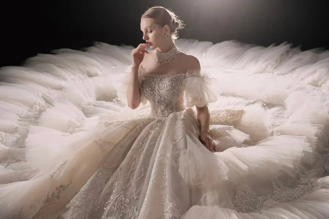 Opulent Off-the-Shoulder Ball Gown Tulle Puff Sleeve Beaded Lace Wedding Dress with Layered Ruffled Train &amp; Choker Q6001 by ZAPDRESS