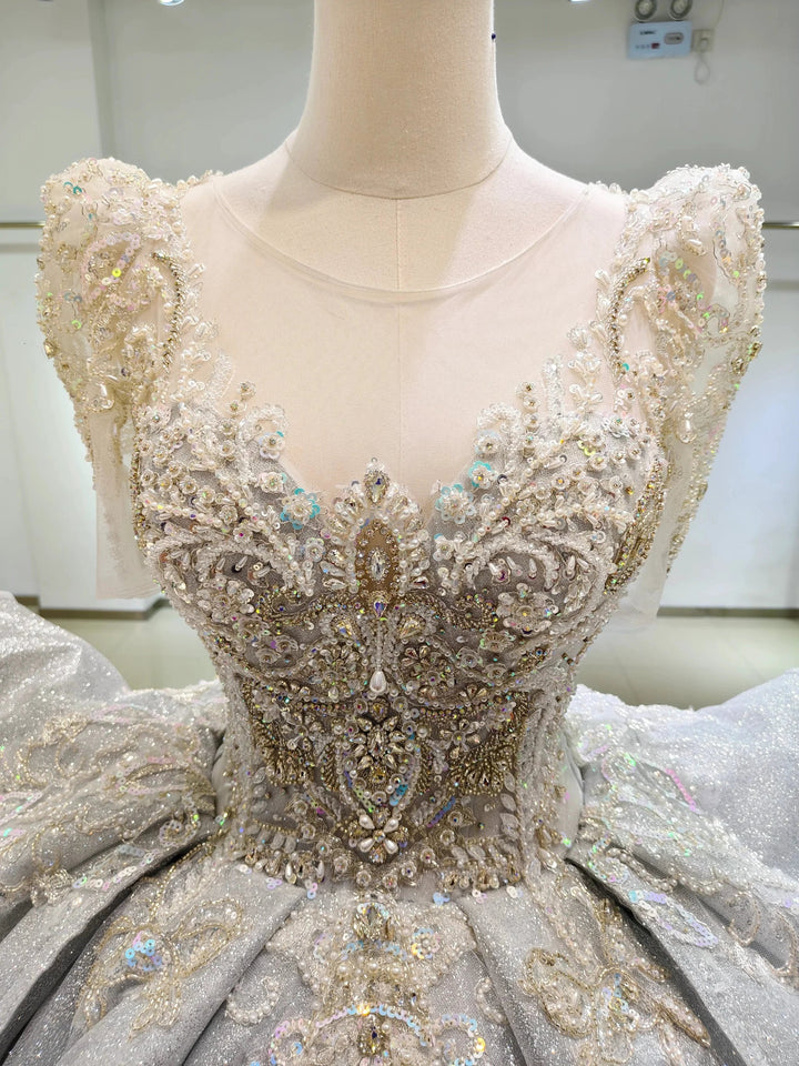 Silver Glimmer V-Neck Ballgown: Crystal-Embroidered Bust &amp; Dramatic Bow Train by ZAPDRESS