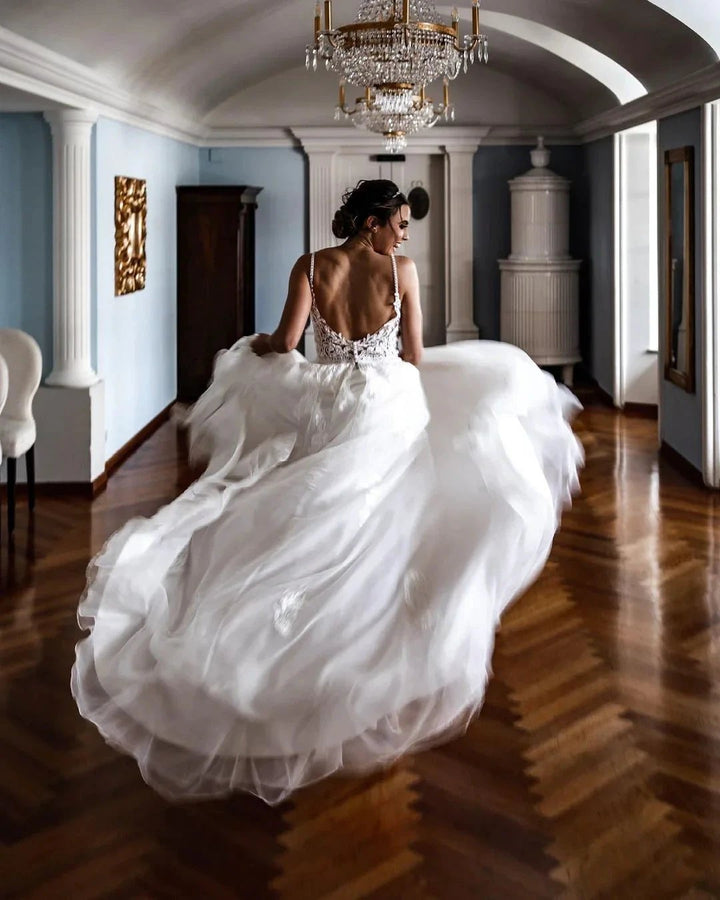 Elegant A-line V-neck Lace Tulle Spaghetti Strap Wedding Dress by BIZTUNNEL