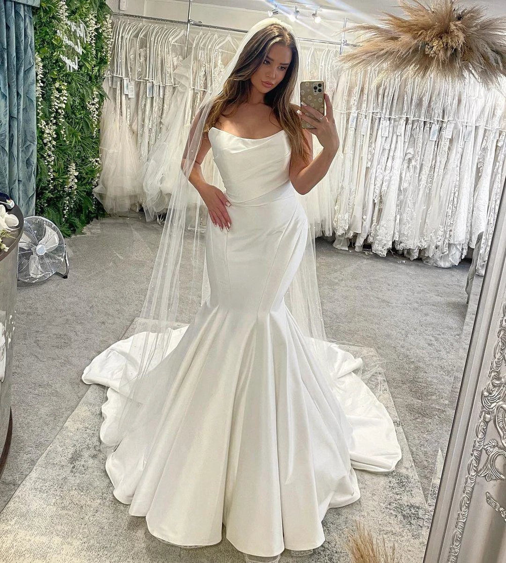 Elegant Floor Length Sleeveless Mermaid Satin Wedding Dress with Ruffles by misshow.com