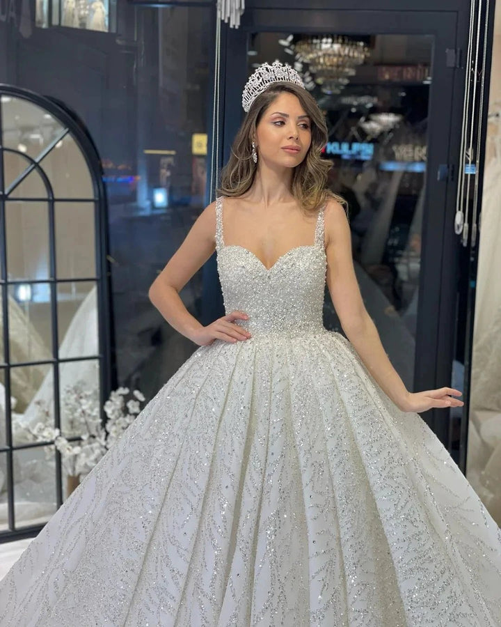 Elegant Floor Length Sweetheart Sleeveless A-Line Sequined Wedding Dress with Ruffles by misshow.com