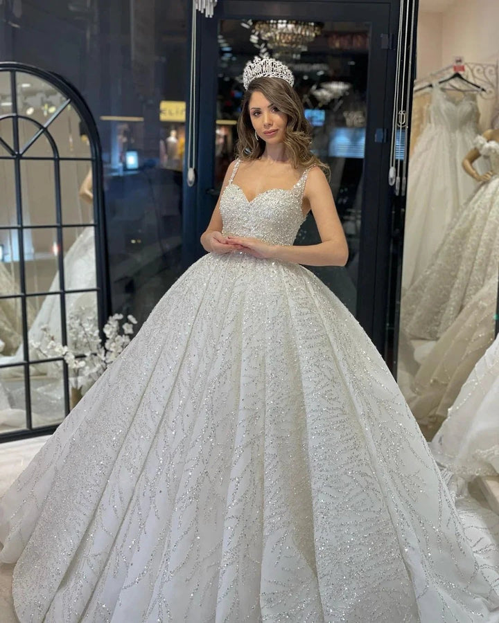 Elegant Floor Length Sweetheart Sleeveless A-Line Sequined Wedding Dress with Ruffles by misshow.com