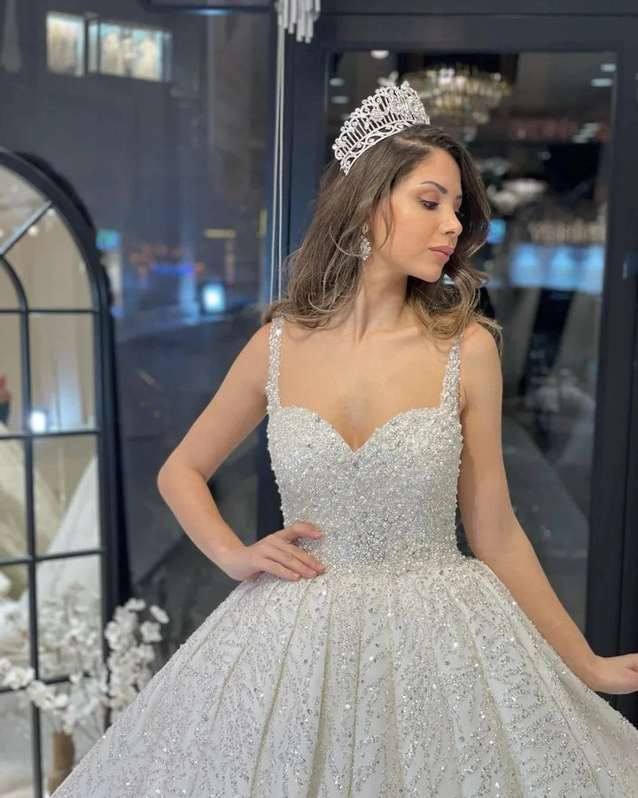 Elegant Floor Length Sweetheart Sleeveless A-Line Sequined Wedding Dress with Ruffles by misshow.com