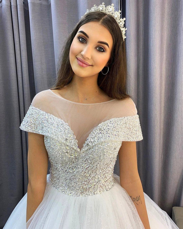 Elegant Long A-Line Bateau Sequins Crystal Tulle Train Wedding Dress with Sleeves by BIZTUNNEL