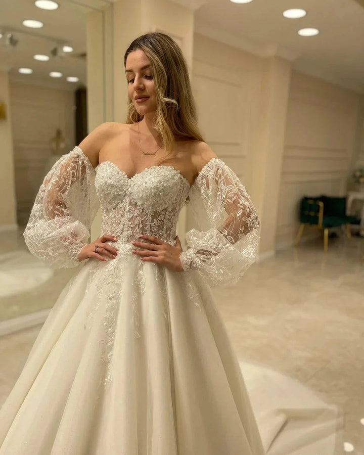 Elegant Long Sleeve A-Line Sweetheart Backless Appliques Lace Wedding Dress by BIZTUNNEL
