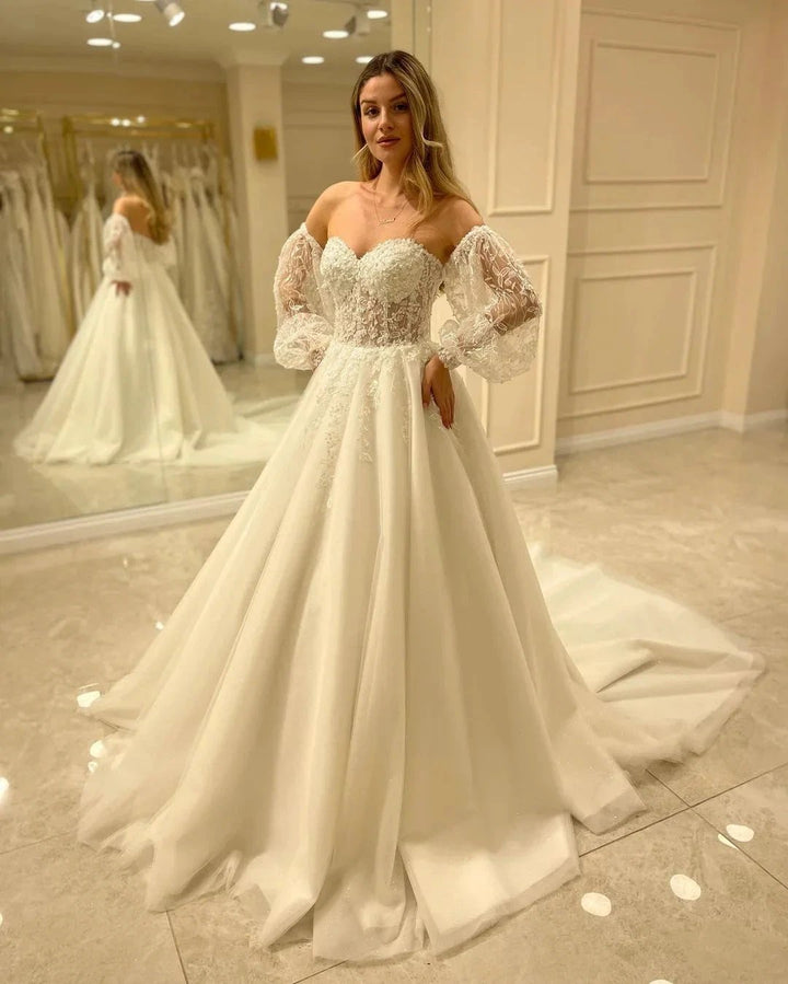 Elegant Long Sleeve A-Line Sweetheart Backless Appliques Lace Wedding Dress by BIZTUNNEL