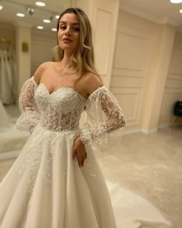 Elegant Long Sleeve A-Line Sweetheart Backless Appliques Lace Wedding Dress by BIZTUNNEL
