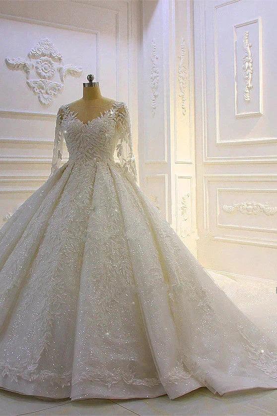 Robe de mariée longue de luxe en tulle avec applications en dentelle et manches