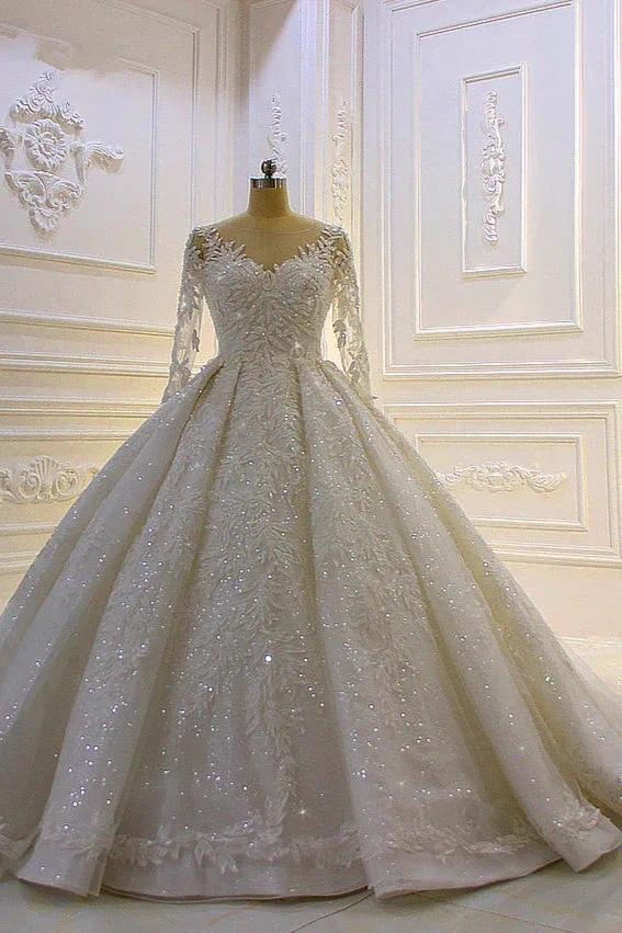Robe de mariée longue de luxe en tulle avec applications en dentelle et manches