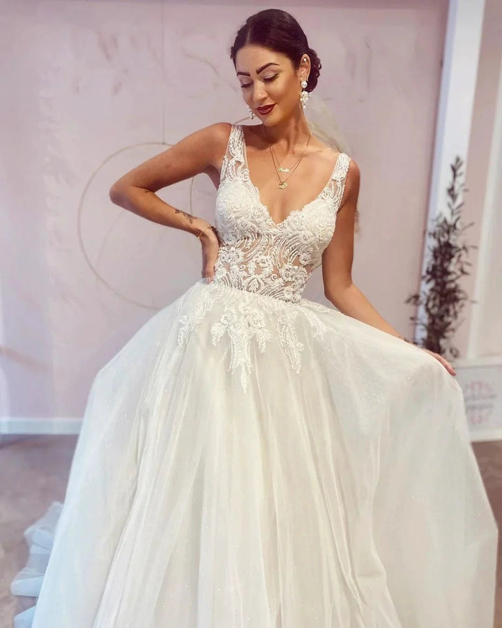 Stunning Long A-Line V-neck Backless Wedding Dress With Appliques Lace by BIZTUNNEL