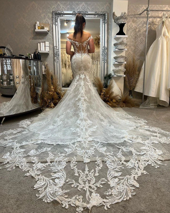 Trendy Floor Length Off-The-Shoulder Sleeveless Mermaid Lace Wedding Dress with Cathedral Train by misshow.com