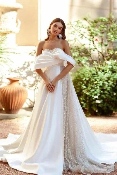 White A-line Sequined Off-the-shoulder Wedding Dress With Ruffles by misshow.com